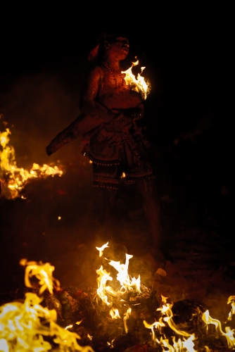 Religious devotee walks in fire