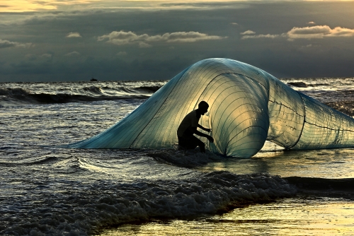 Netted Fisherman